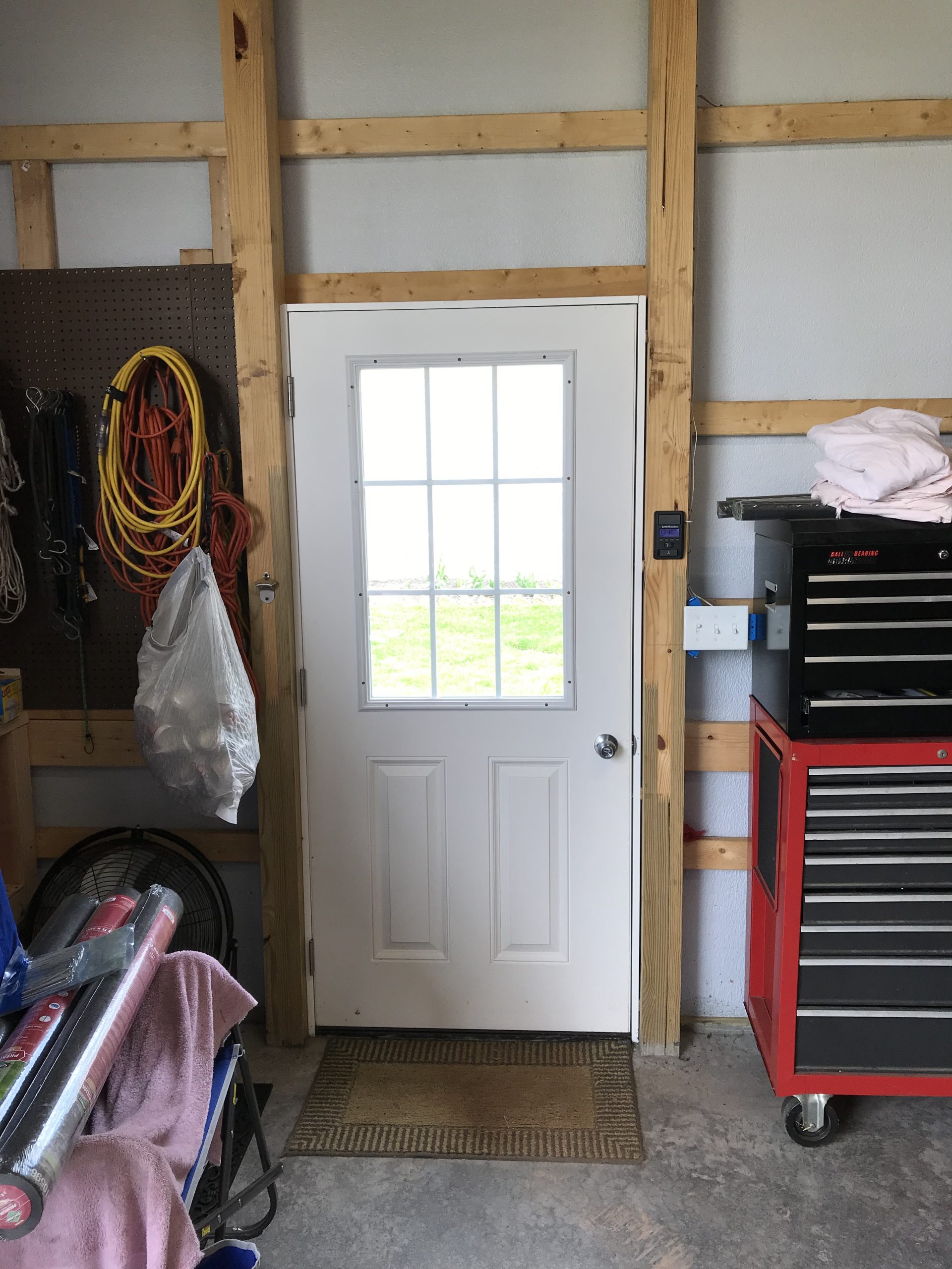 new door installation in pole barn garage