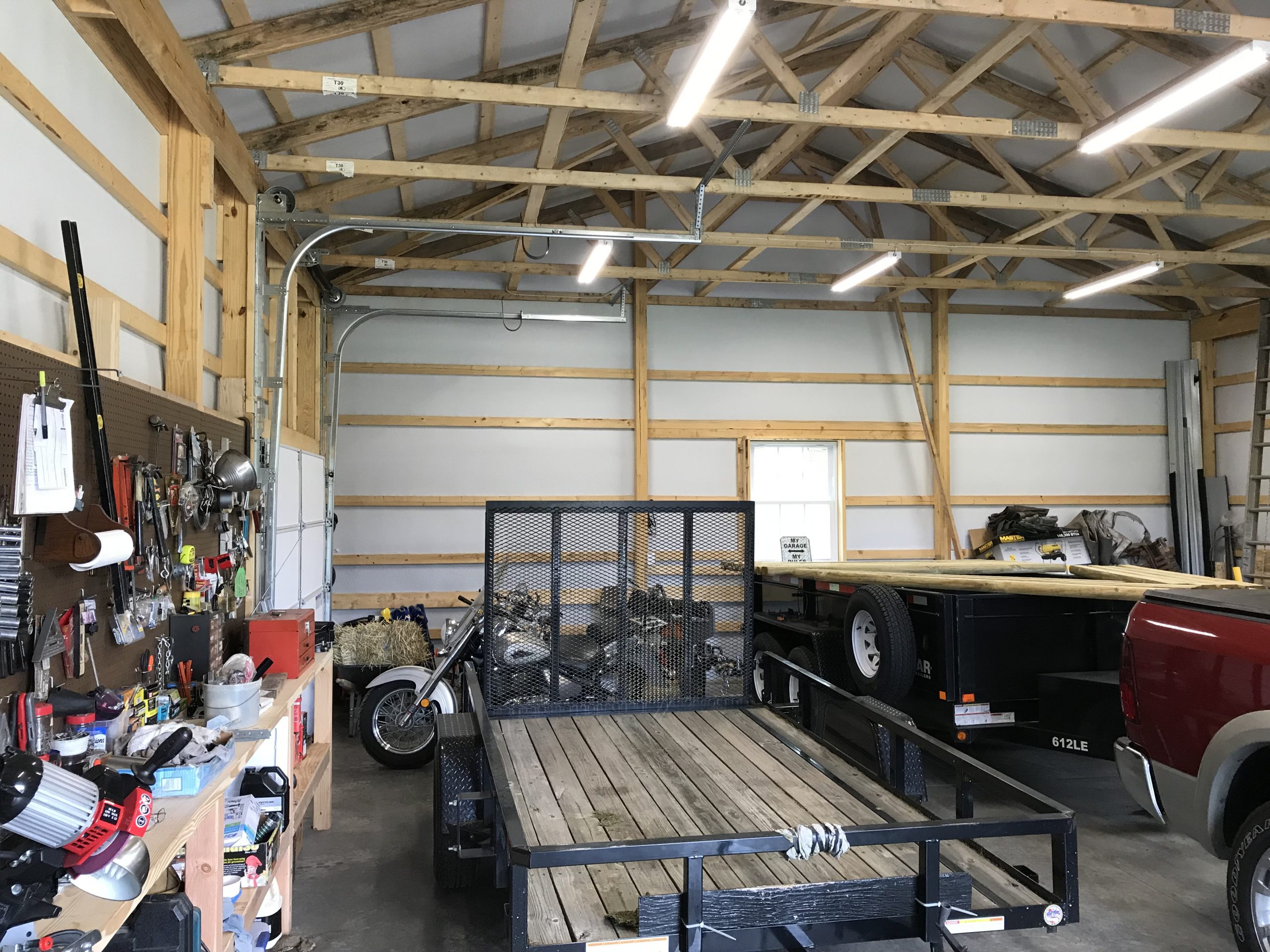 interior shot of a pole garage with car and tools