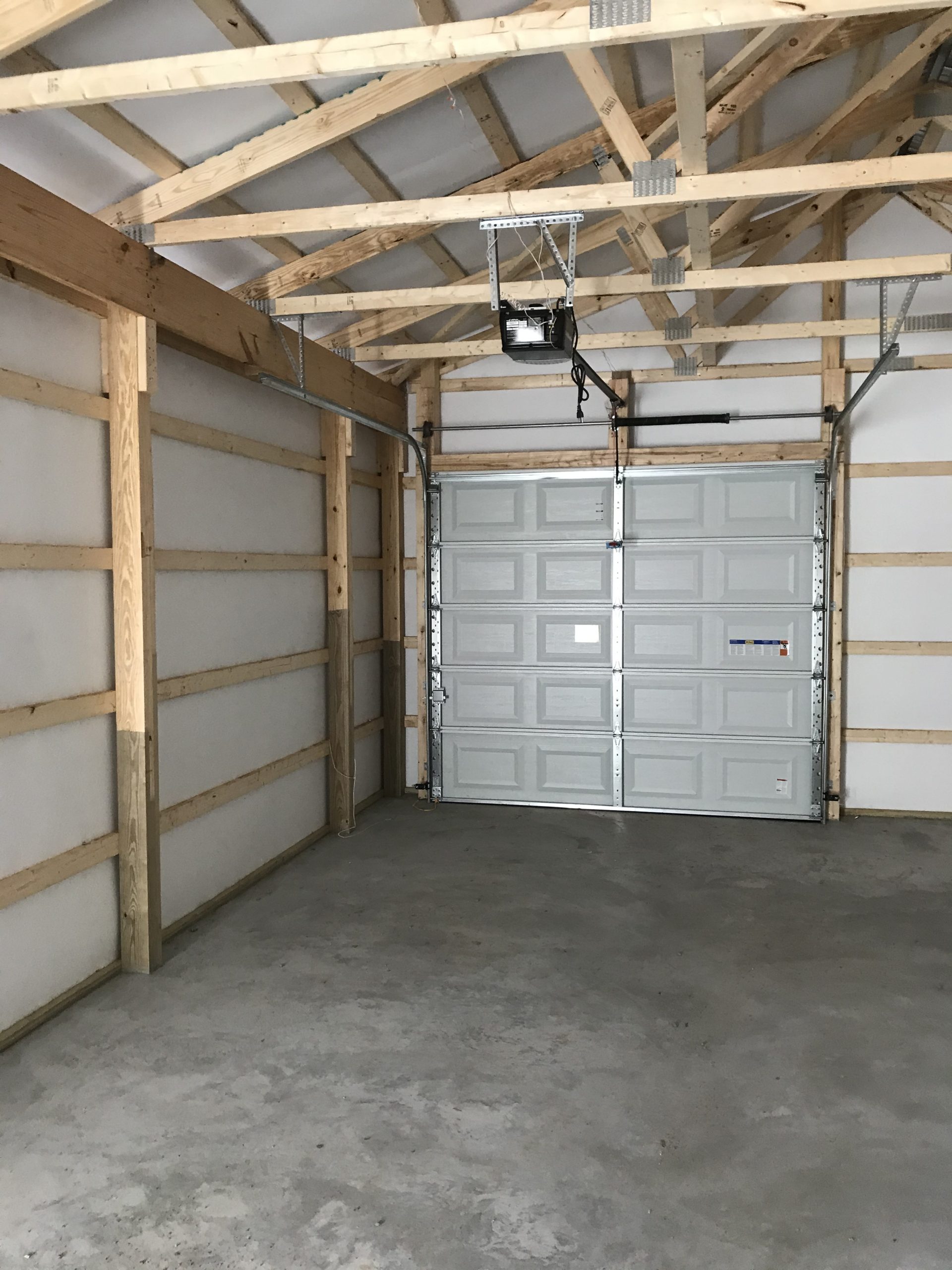 post frame wooden beams in new garage