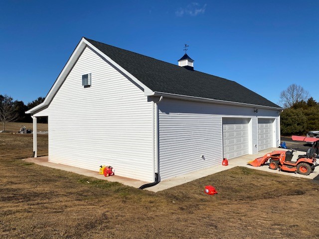 residential garage with cupola